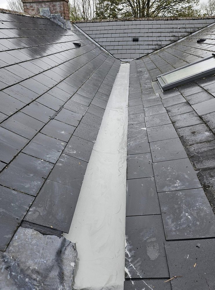 Slide of Pecan Park Roofing