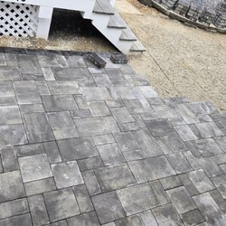 Garcia's Landscaping - Installing the new pavers
