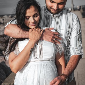 Fintography - Playing around with some color as we build excitement for their expected baby boy! This maternity photo was a blast! - Real Estate Photography Near Me