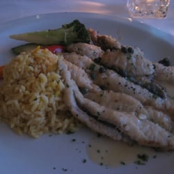 Max's Grill - Sand Dabs sauteed in white wine and butter with capers, served with vegetables and saffron rice