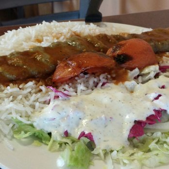Zand's Persian Kebabs - Fresh salad with garlicky dressing. - Persian/Iranian Near Me - Bryan, Texas Zand's Persian Kebabs - Fresh salad with garlicky dressing. - Persian/Iranian Near Me - Bryan, Texas