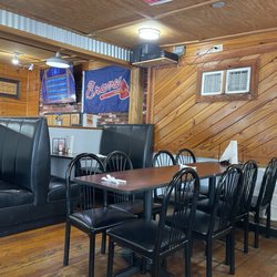 Pizza Bella - Dining room area. They have booths and tables and some bigger tables