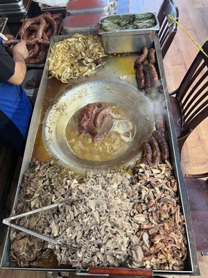 Photo of Tacos & Carnitas Sahuayo - Santa Ana, CA, US. Liver, chorizo and other assorted meats.