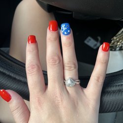 Lena Nails - This is what I got and they didn't do a top coat to make sure the stars were covered!