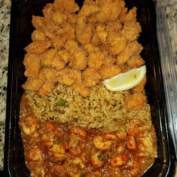 Pappadeaux Seafood Kitchen - Crawfish Platter- Half Fried Crawfish, Half Crawfish Etouffee with Dirty Rice. - Seafood Near Me - Austin, Texas