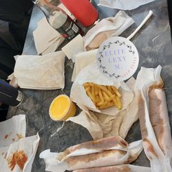 A J Texas Hots - $40 for 3 fries, 2 drinks, 8 Texas hot dogs, a cheese sauce, and 5 cheese burgers.