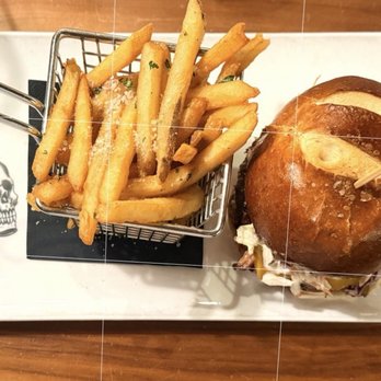 Guy Fieri's Foxwoods Kitchen & Bar - Smokehouse BBQ smash burger and garlic parm fries. - American Near Me - Mashantucket, Connecticut Guy Fieri's Foxwoods Kitchen & Bar - Smokehouse BBQ smash burger and garlic parm fries. - American Near Me - Mashantucket, Connecticut