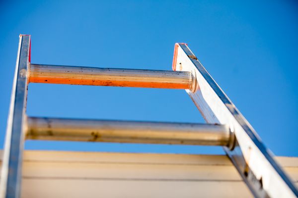 Rick's Roofing Company Logo