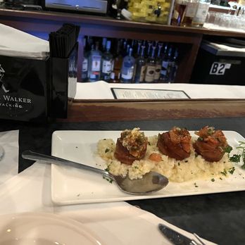Luciano's Restaurant - Scallops warped in Bacon on a Bed of Risotto - Italian Near Me - Wrentham, Massachusetts Luciano's Restaurant - Scallops warped in Bacon on a Bed of Risotto - Italian Near Me - Wrentham, Massachusetts