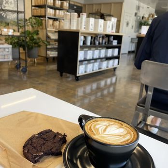 Unincorporated Coffee Roasters - Oatmilk cappuccino and a chocolate cookie - Coffee Roasteries Near Me - Altadena, California Unincorporated Coffee Roasters - Oatmilk cappuccino and a chocolate cookie - Coffee Roasteries Near Me - Altadena, California