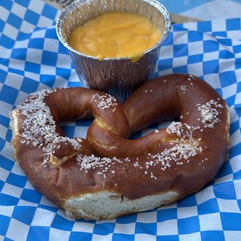 Big Bear Lake Oktoberfest - Small pretzel with cheese dip sauce - Festivals Near Me - Big Bear Lake, California Big Bear Lake Oktoberfest - Small pretzel with cheese dip sauce - Festivals Near Me - Big Bear Lake, California