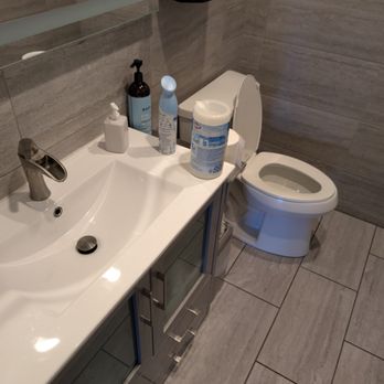Prime Flow Plumbing and Remodeling - Commercial bathroom with ADA height sink with a power flush toilet. - Plumbing Near Me - Draper, Utah