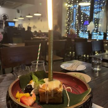 Sup Thai Kitchen  - Birthday candle with bread pudding dessert- to die for! - Thai Near Me - Fresh Meadows, New York