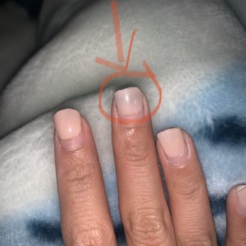 H2O Nails Spa - Right middle finger. Dark greenish peaking through. - Nail Salons Near Me - Monrovia, California