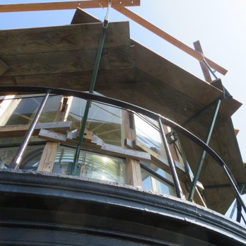 Currituck Beach Lighthouse - Light with repair scaffolding - Landmarks & Historical Buildings Near Me - Corolla, North Carolina Currituck Beach Lighthouse - Light with repair scaffolding - Landmarks & Historical Buildings Near Me - Corolla, North Carolina