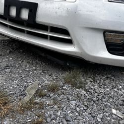 Hamilton Place - Damage to underside of the car, I assume they ran over something large which caused the other damage to the front of the car