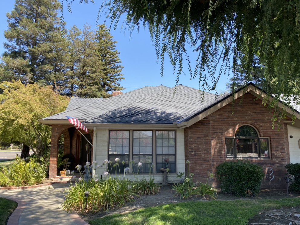 Slide of Modern Roofers and Restoration