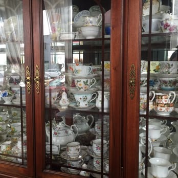 La Petite Cuillère - Several China cabinets filled with tons of tea cups!! - Tea Rooms Near Me - Vancouver, British Columbia