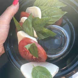 $16 for this Caprese salad to go seems a bit overpriced for a few pieces of tomato and basil $16 for this Caprese salad to go seems a bit overpriced for a few pieces of tomato and basil