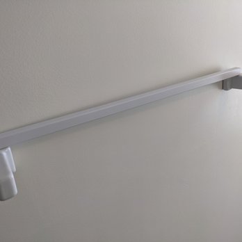 Carolina Designs Realty & Vacation Rentals - These are dollar store towel holder ... a joke!  They are found throughout house. - Vacation Rentals Near Me - Duck, North Carolina