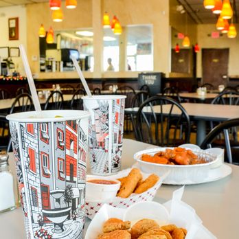 Empire Pizza - a cup of coffee and a plate of food - Pizza Near Me - Jacksonville, North Carolina