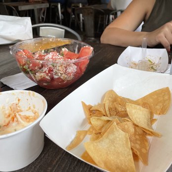 Eight Row Flint - Chips and queso and watermelon salad - Gastropubs Near Me - Houston, Texas