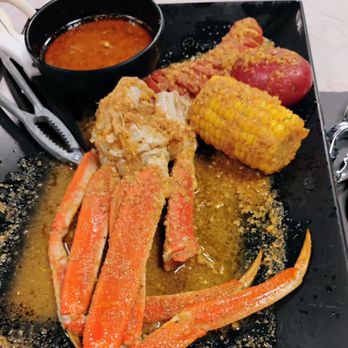 Crawfish & Noodles - Order 1 lb snow crab in their signature seasoning, the other half pound tamarind - Vietnamese Near Me - Houston, Texas Crawfish & Noodles - Order 1 lb snow crab in their signature seasoning, the other half pound tamarind - Vietnamese Near Me - Houston, Texas