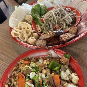Photo of Spicy Joi Banh Mi-Noodles-Lao Street Food - Concord, CA, United States. Kua Kee Mao (Fried Flat Rice Noodle) and Bomb Platter...