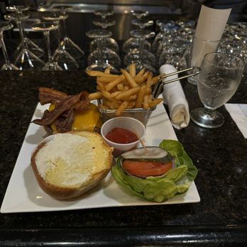 Earharts - Burger with fries. Very big portion, I saved half for later. - Sports Bars Near Me - Oakland, California