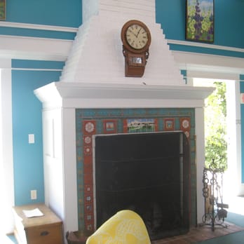 Mackinac Island Public Library - fireplace with complementary tile surround! - Libraries Near Me