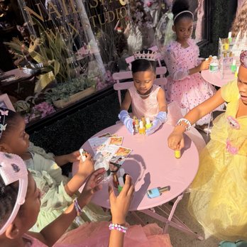Earth and Mani Spa - Girls selecting their nail polish colors. - Nail Salons Near Me - Newark, New Jersey