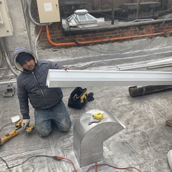Mbh Roofing and Waterproofing - New gutter getting prepped - Waterproofing Near Me - Brooklyn, New York