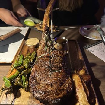 Suwanee Social - TOMAHAWK RIBEYE - Bars Near Me - Suwanee, Georgia Suwanee Social - TOMAHAWK RIBEYE - Bars Near Me - Suwanee, Georgia