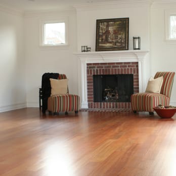 Kapalua Floors - a living room with a fire place - Flooring Near Me - Troy, Michigan Kapalua Floors - a living room with a fire place - Flooring Near Me - Troy, Michigan