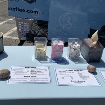 CappuGino's Coffee & Shakes - Cool side table to let people view the menu before they got in line. - Juice Bars & Smoothies Near Me - Milford, Connecticut