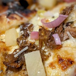 Bonfire Craft Kitchen & Tap House - Luau pizza, with red onion, pulled pork and pineapple