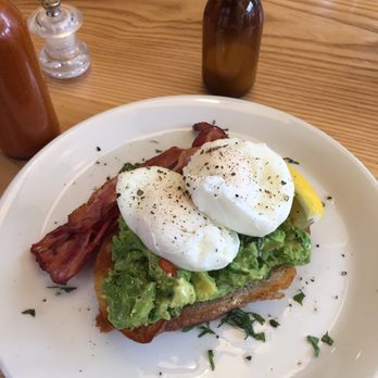 NORTHSIDE Espresso + Kitchen - Avocado smash with poached eggs and bacon on sourdough! - Cafes Near Me - Kingston, Ontario