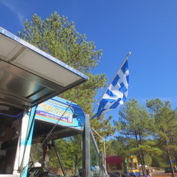 Gussy's - Love the Greek flag fluttering in the breeze. - Food Trucks Near Me