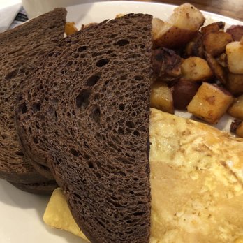 Nellie Rose - The Train Station - Early Bird cheese omelette with home fries and toast. Delicious! - Breakfast & Brunch Near Me - Middleboro, Massachusetts