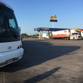 Laredo Taco Company - a truck and a bus in a parking lot - Convenience Stores Near Me - Falfurrias, Texas Laredo Taco Company - a truck and a bus in a parking lot - Convenience Stores Near Me - Falfurrias, Texas