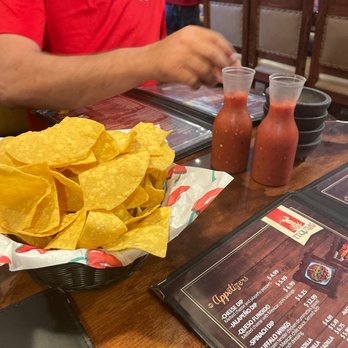 Tequila's Mexican Grill - a man sitting at a table with chips and salsa - Mexican Near Me - Goodland, Kansas Tequila's Mexican Grill - a man sitting at a table with chips and salsa - Mexican Near Me - Goodland, Kansas
