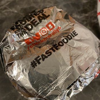 Checkers - a fast food sandwich wrapped in aluminum foil - Fast Food Near Me - Pontiac, Michigan