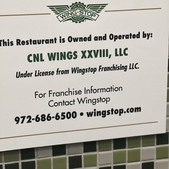 Wingstop - Signage on wall, stating who owns and operates this location. - Chicken Wings Near Me - San Antonio, Texas Wingstop - Signage on wall, stating who owns and operates this location. - Chicken Wings Near Me - San Antonio, Texas