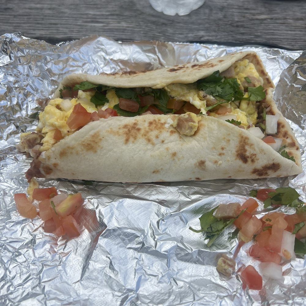 The Good Taco - The Spamela Anderson, A step out of the 90s breakfast taco, it is filled with spam, grilled onions, eggs, and spam. - Tacos Near Me - Edna, Texas The Good Taco - The Spamela Anderson, A step out of the 90s breakfast taco, it is filled with spam, grilled onions, eggs, and spam. - Tacos Near Me - Edna, Texas