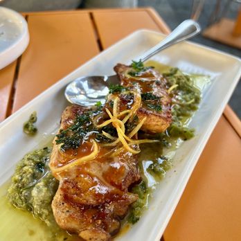 Bravas Bar de Tapas - Crispy chicken thighs on green olive tapenade. - Spanish Near Me - Healdsburg, California