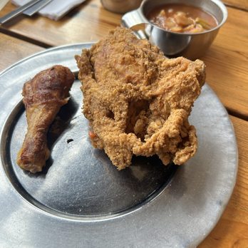Michie Tavern - Fried chicken breast and a baked chicken leg. - Landmarks & Historical Buildings Near Me - Charlottesville, Virginia Michie Tavern - Fried chicken breast and a baked chicken leg. - Landmarks & Historical Buildings Near Me - Charlottesville, Virginia