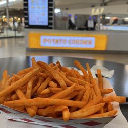 Potato Corner Arrowhead - Giga fries with cheddar.