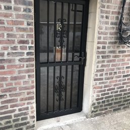 the front door of a brick building