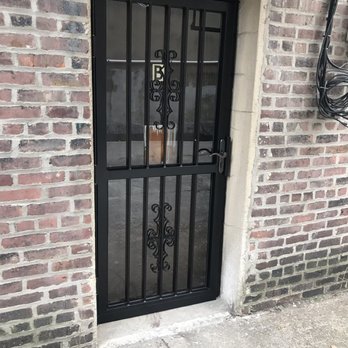 Weber Carpentry & Home Improvement - the front door of a brick building - General Contractors Near Me - Pattersonville, New York