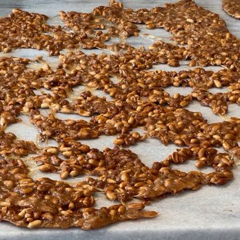 Kilwins Ice Cream - Chocolate - Fudge - This is straight up the most peanuts in a peanut Brittle I have ever seen! - Chocolatiers & Shops Near Me - St. Augustine, Florida